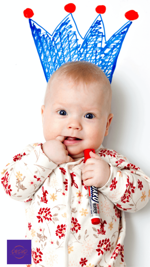 Adorable baby with a crown on his head